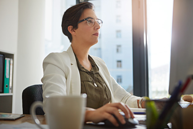 Confident And Determined Woman In Office